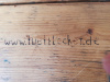 eingebrannter Text auf einer Holzplatte www.lüttlecker.de